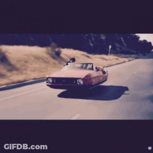Man And Woman In Car With BMW Shirt GIF