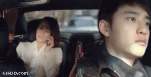 Man And Woman In Car Woman On Phone GIF