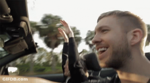 Man And Woman In Convertible Car GIF