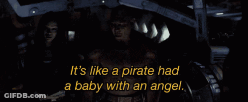 Man And Woman In Dark Room Saying It's Like A Pirate Had A Baby With An Angel GIF