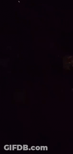 Man And Woman In Dark Room GIF