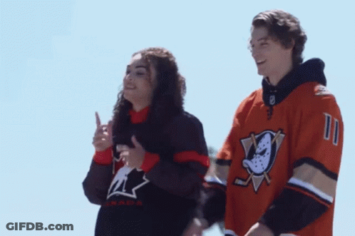 Man And Woman In Ducks Jerseys GIF