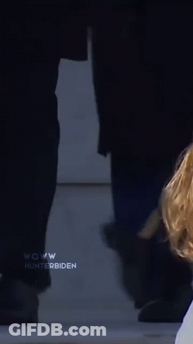 Man And Woman In Face Masks GIF