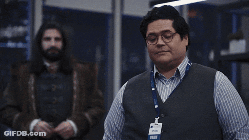 Man And Woman In Face Masks Saying Okay Okay GIF