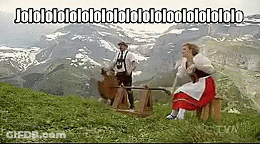 Man And Woman In Field With Jololololololololololololo Sign GIF