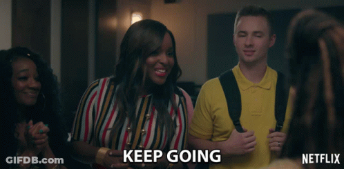 Man And Woman In Front Of Brick Building Saying If You Ever Want To Catch Up GIF