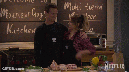 Man And Woman In Front Of Chalkboard Saying Monsieur Guy GIF