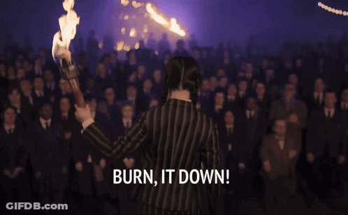 Man And Woman In Front Of Fire Burn It Down GIF