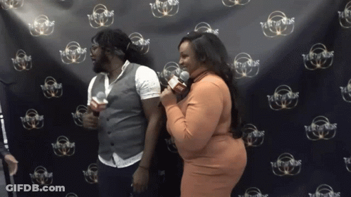Man And Woman In Front Of Party Sounds Wall GIF