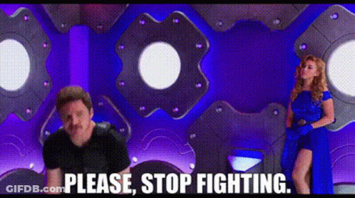 Man And Woman In Front Of Purple Wall Saying Please Stop Fighting GIF