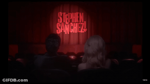 Man And Woman In Front Of Stephen Sanchez Stage GIF