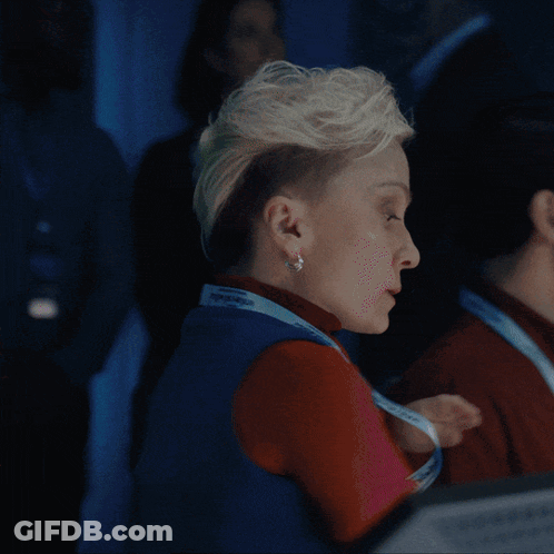 Man And Woman In Front Of Transmit Live Screen GIF
