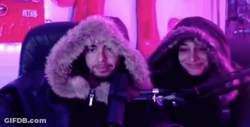 Man And Woman In Furry Hoodies GIF
