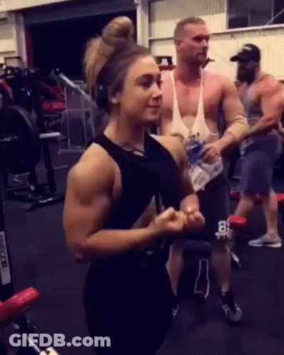 Man And Woman In Gym GIF