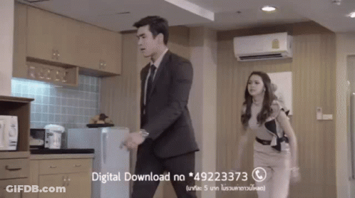 Man And Woman In Kitchen With Download Ad GIF