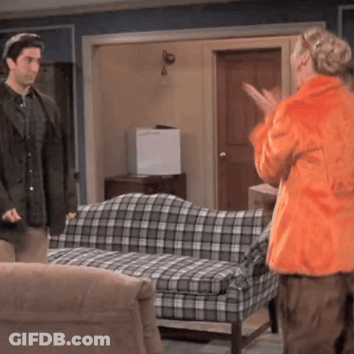 Man And Woman In Living Room GIF