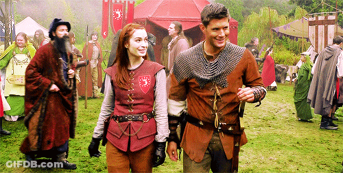 Man And Woman In Medieval Costumes GIF