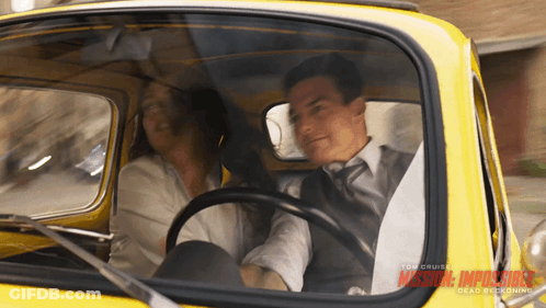 Man And Woman In Mission Impossible Car GIF