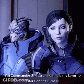 Man And Woman In N7 Uniform GIF