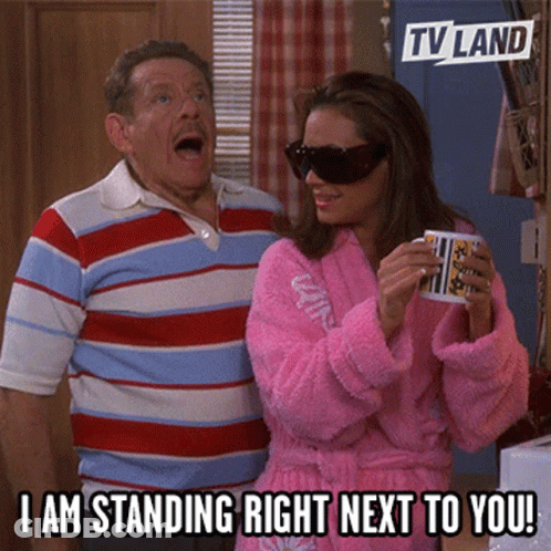 Man And Woman In Pink Bathrobe And Sunglasses GIF