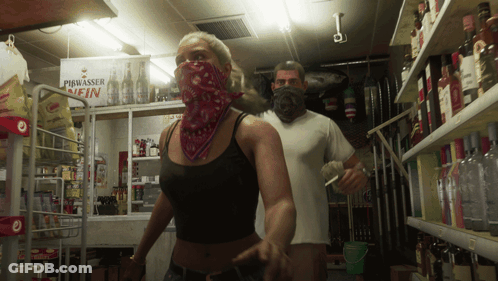 Man And Woman In Store With Piwasser Fin Sign GIF