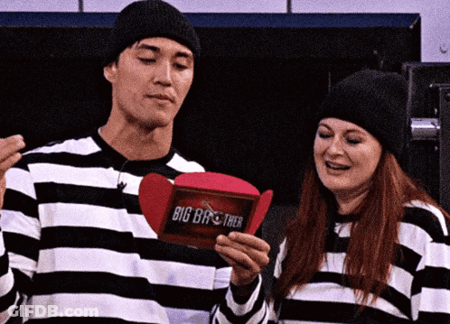 Man And Woman In Striped Shirts Holding Box Saying Big Brother GIF