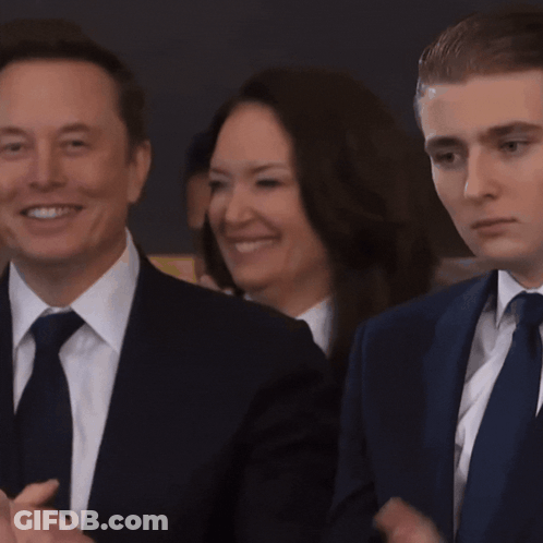 Man And Woman In Suits And Ties GIF