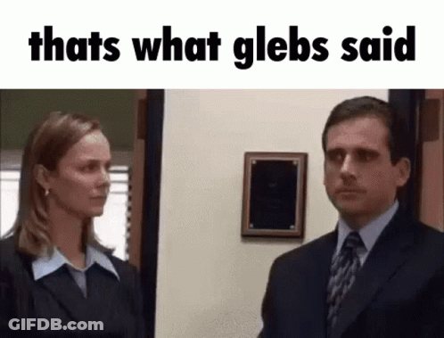Man And Woman In Suits Standing GIF