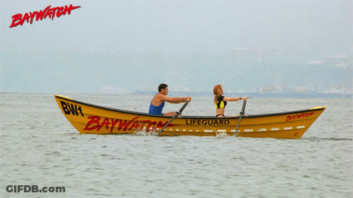 Man And Woman In Yellow Baywatch Lifeguard Boat GIF