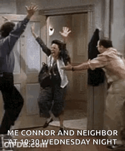 Man And Woman Jumping In Air In Front Of Door GIF