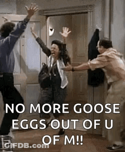 Man And Woman Jumping In Room With Door GIF