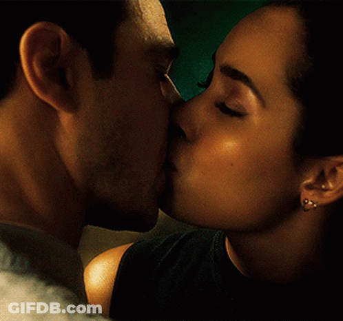 Man And Woman Kissing GIF