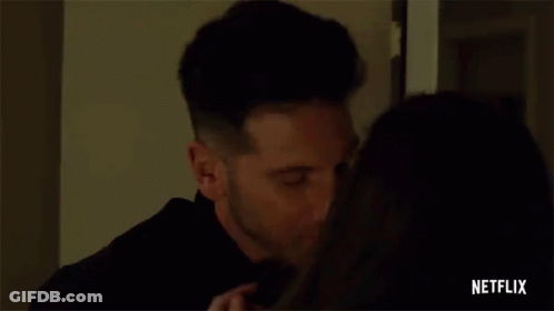 Man And Woman Kissing GIF