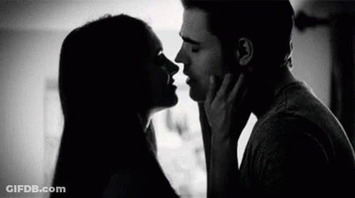 Man And Woman Kissing GIF