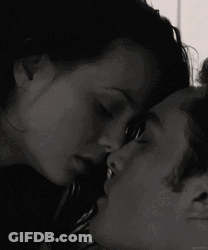 Man And Woman Kissing GIF