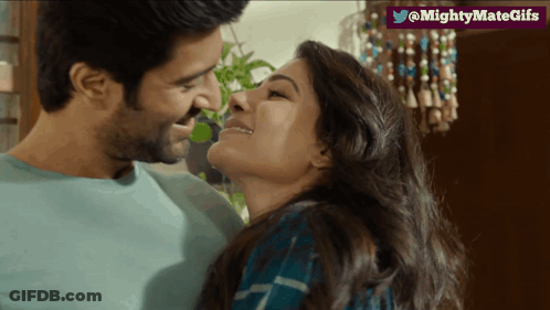 Man And Woman Kissing GIF