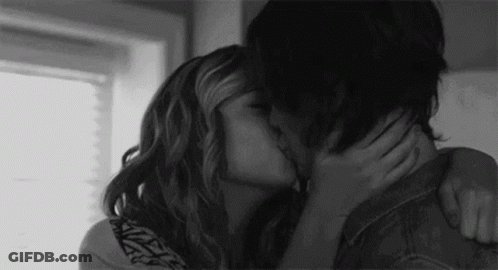 Man And Woman Kissing GIF