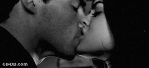 Man And Woman Kissing GIF