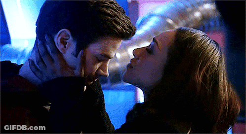 Man And Woman Kissing GIF