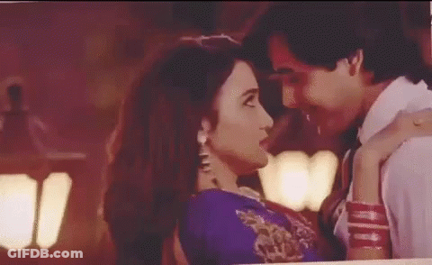 Man And Woman Kissing And Hugging GIF