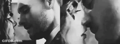Man And Woman Kissing And Smoking GIF