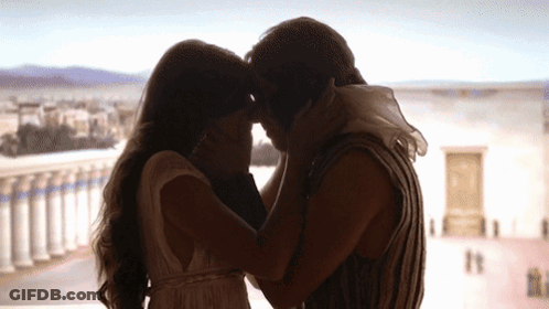 Man And Woman Kissing At Window GIF