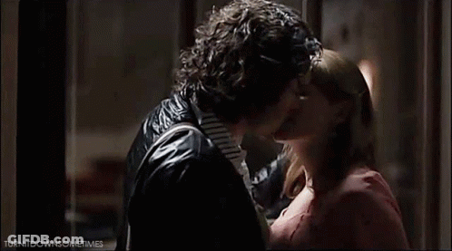 Man And Woman Kissing GIF