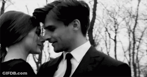 Man And Woman Kissing Black And White Photo GIF