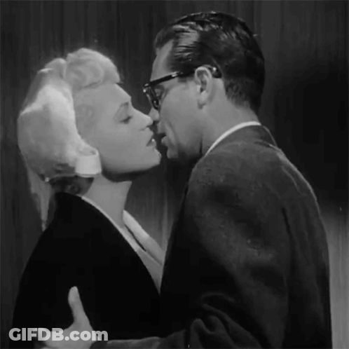 Man And Woman Kissing Black And White GIF