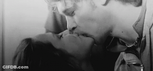 Man And Woman Kissing GIF
