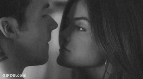 Man And Woman Kissing GIF