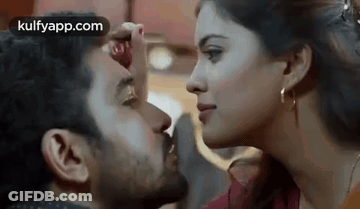 Man And Woman Kissing Cheek GIF