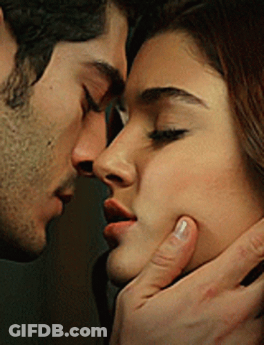 Man And Woman Kissing Close Up GIF
