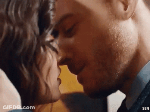 Man And Woman Kissing Close Up GIF